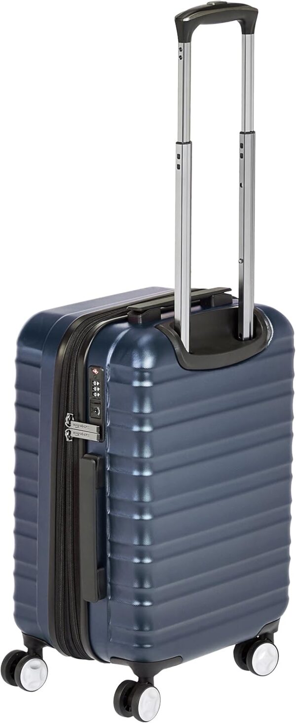 Amazon Basics 21-inch Carry On Luggage, Suitcase With Wheels (8 Spinner Wheels), TSA Lock, Expandable Capacity, Interior Divider and Pocket For Dry and Damp Clothes, Navy Blue - Image 3